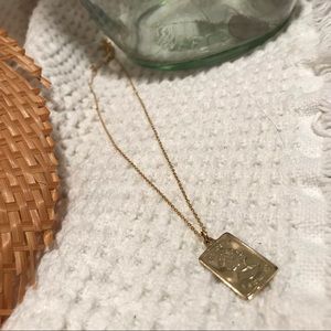 Queen Elizabeth gold bar necklace